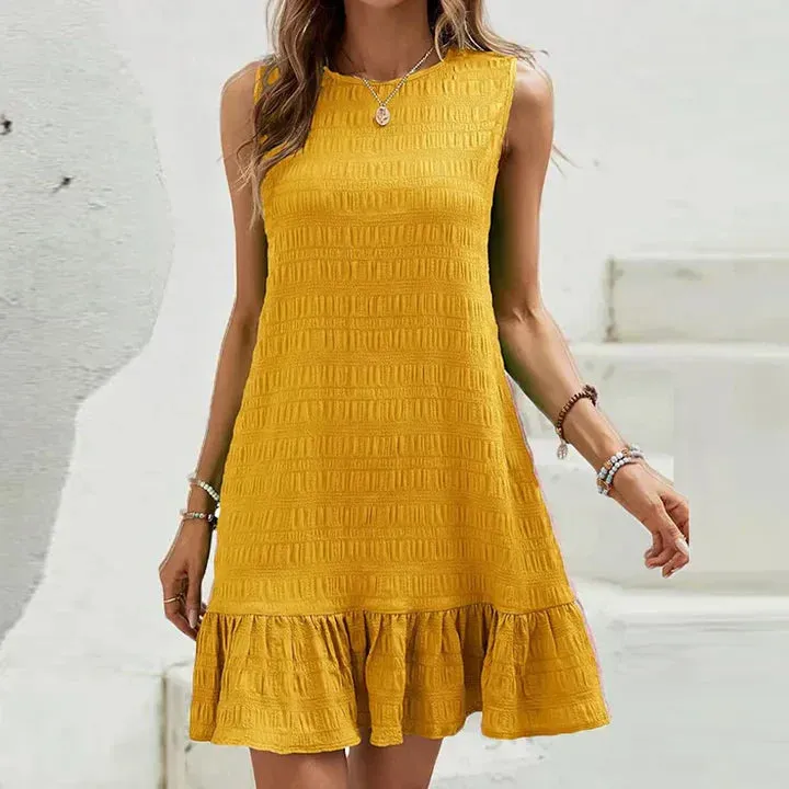 Amparo - Smocked dress with ruffles.
