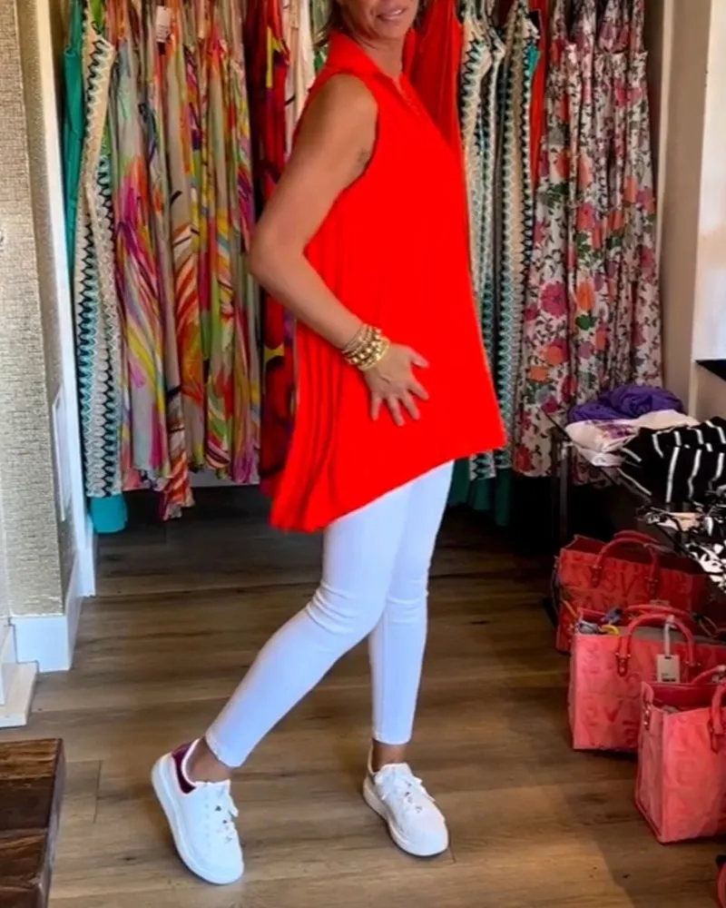 Veronika | Sleeveless top with ruffles and turn-ups