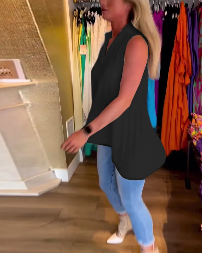Veronika | Sleeveless top with ruffles and turn-ups