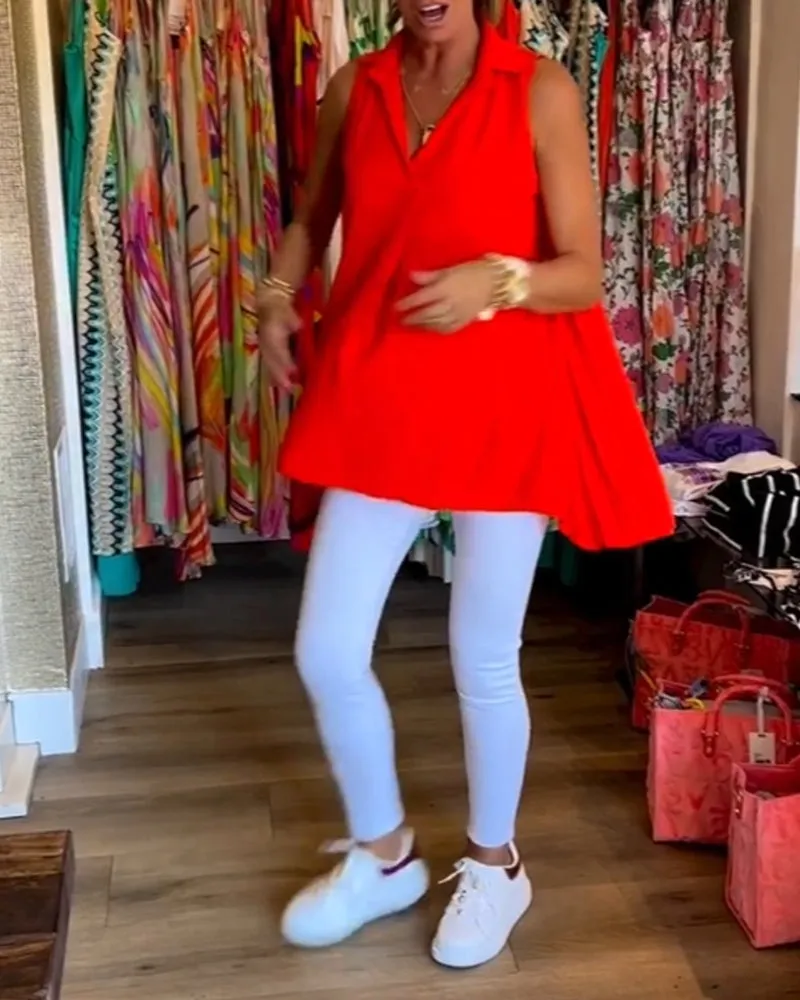 Veronika | Sleeveless top with ruffles and turn-ups