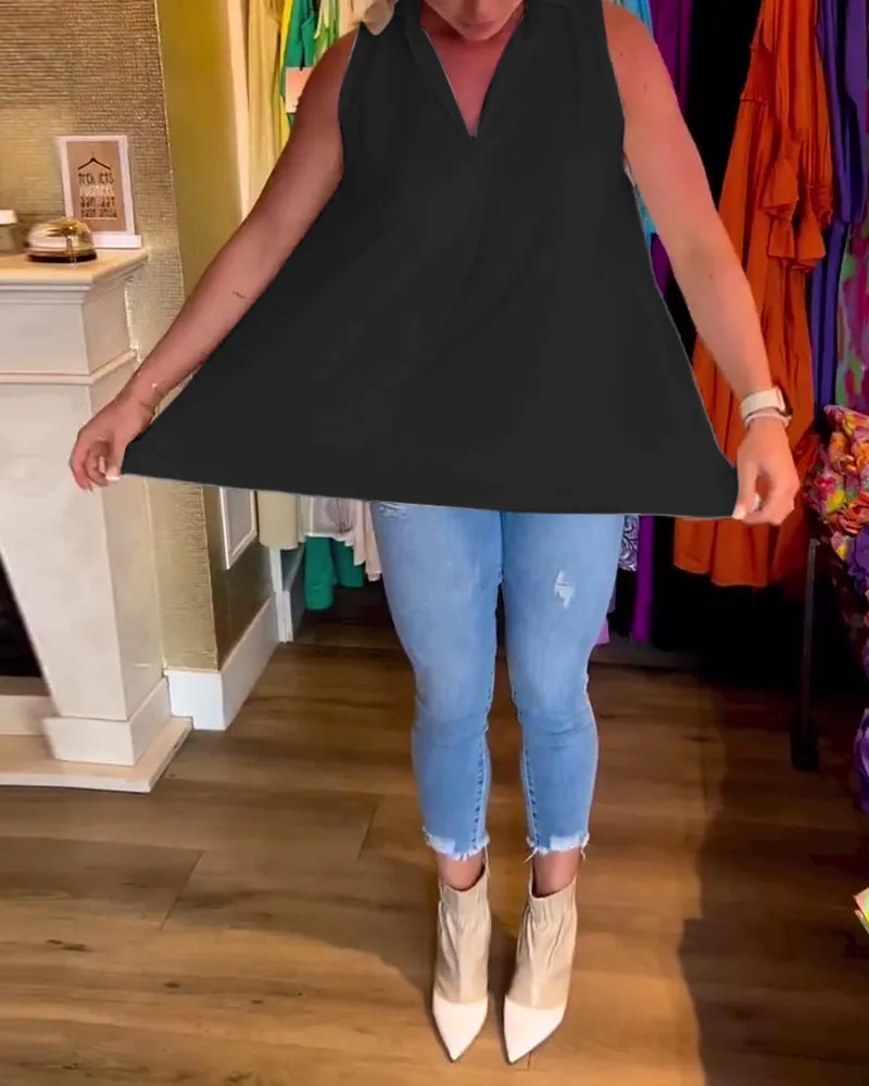 Veronika | Sleeveless top with ruffles and turn-ups