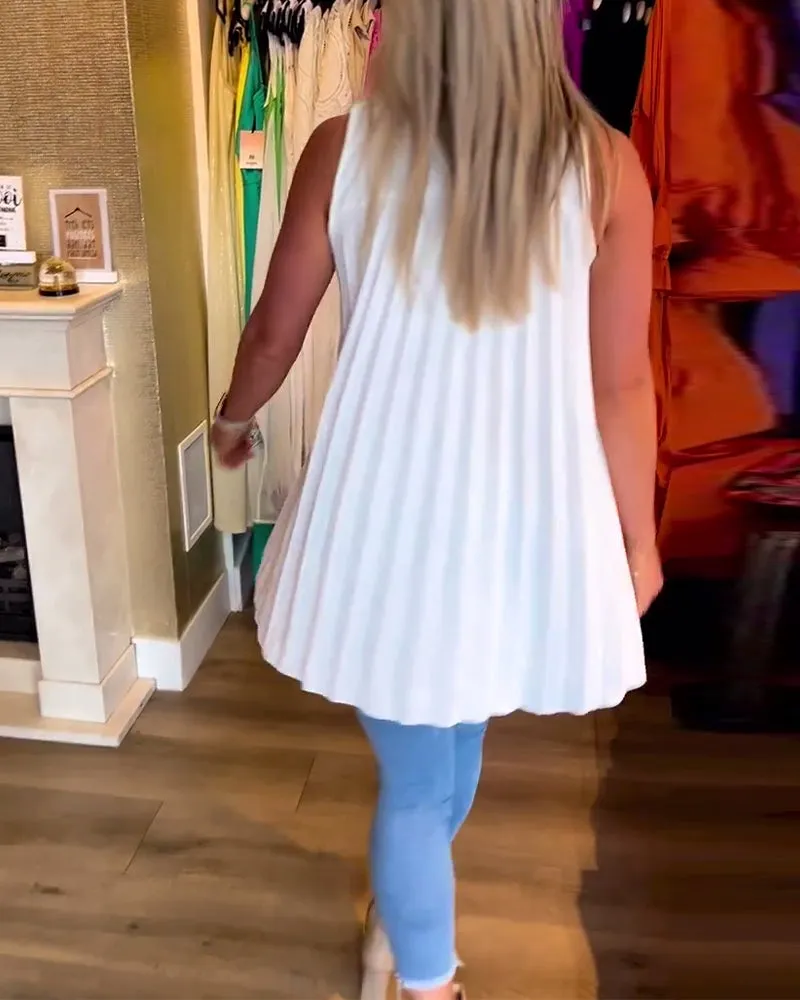 Veronika | Sleeveless top with ruffles and turn-ups