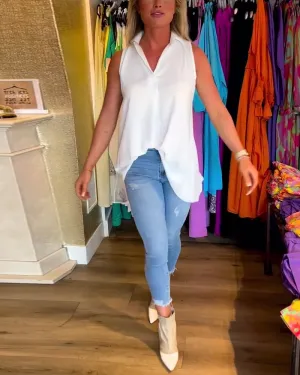 Veronika | Sleeveless top with ruffles and turn-ups