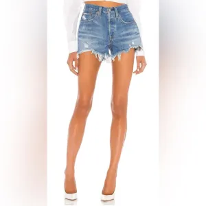 VINTAGE 90s Levi’s 501 cut off denim SHORTS